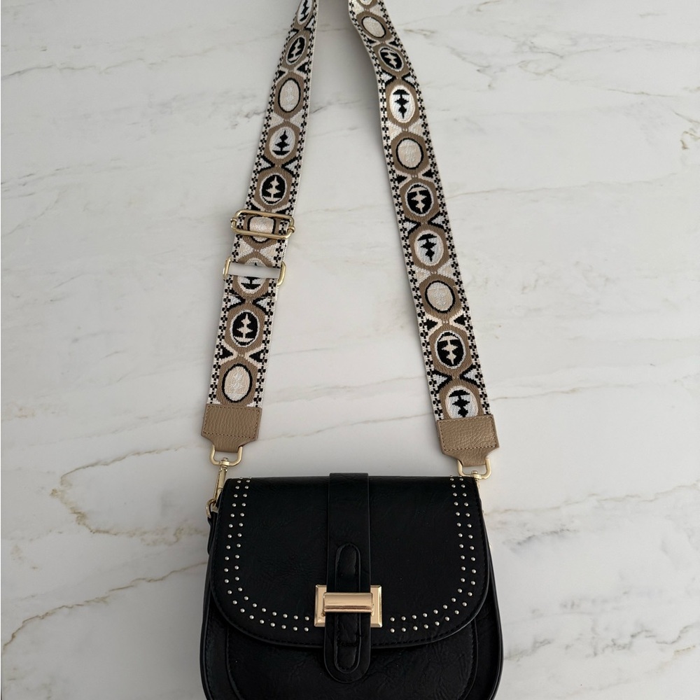 Stylish Black Leather Bag with Patterned Strap
